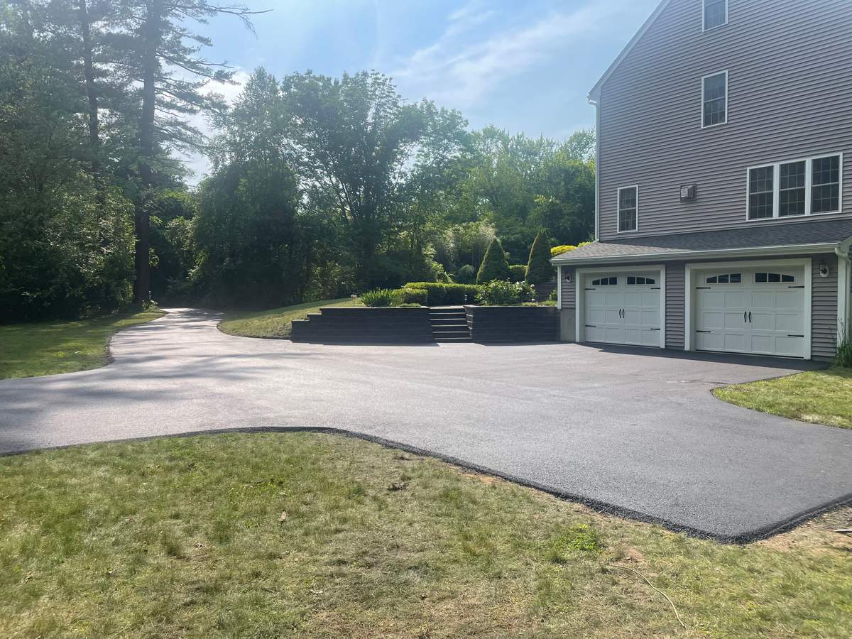 Fresh asphalt driveway by Kane Paving